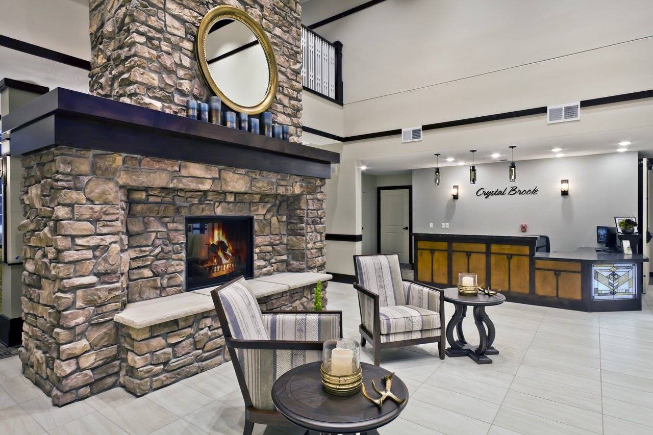 lobby with large stone fireplace