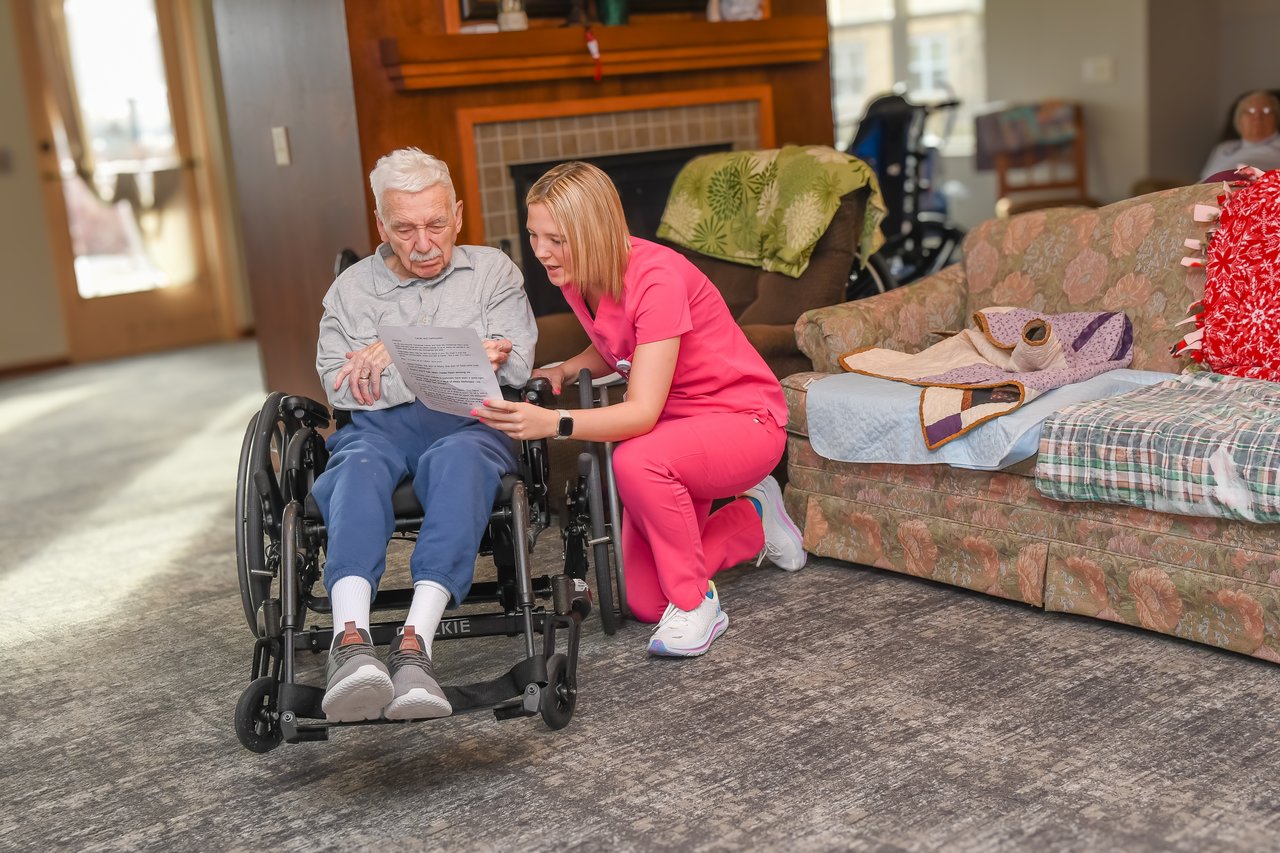 nurse with man in wheelchair