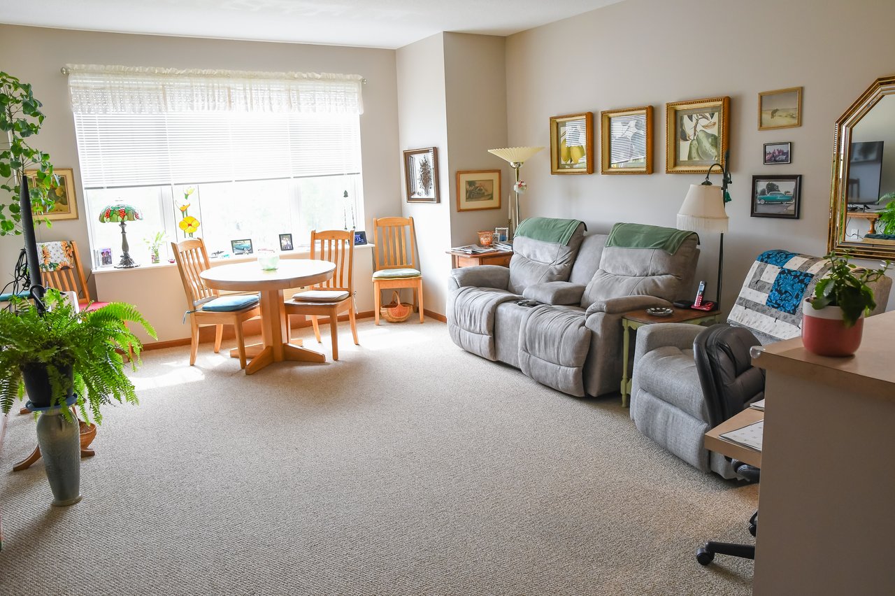 sunny room with chairs and table