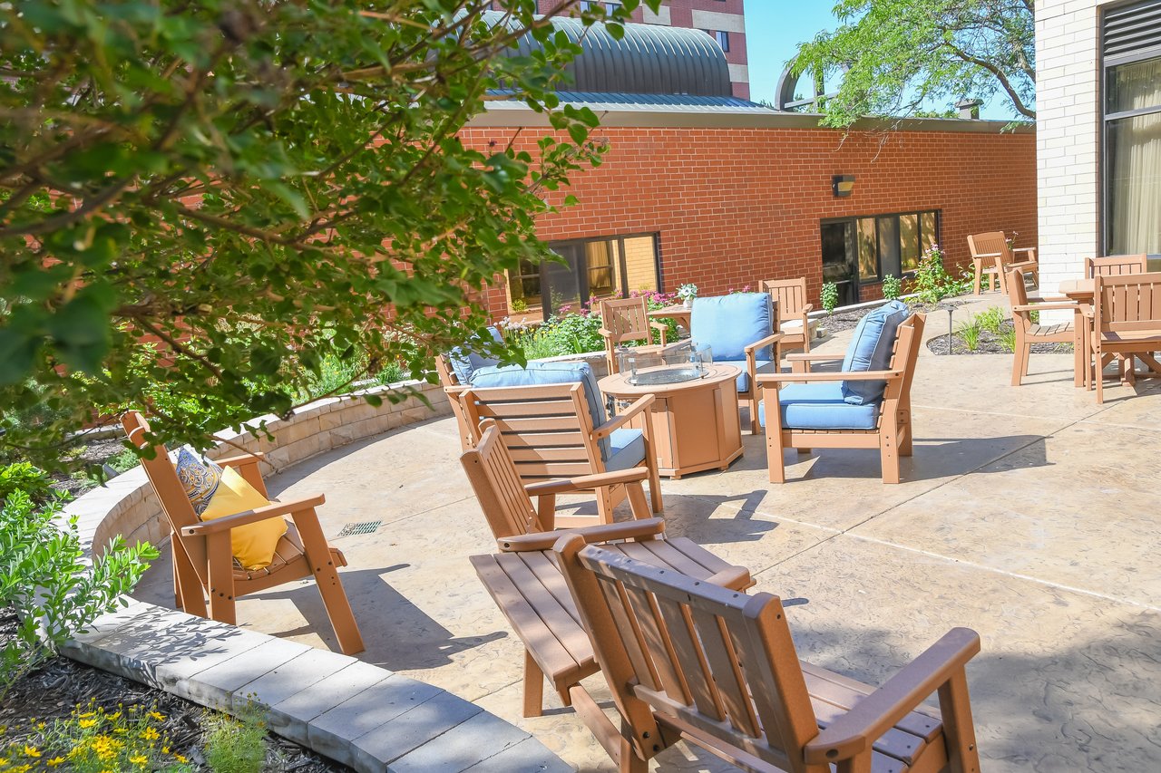 sunny outdoor patio with lots of chairs