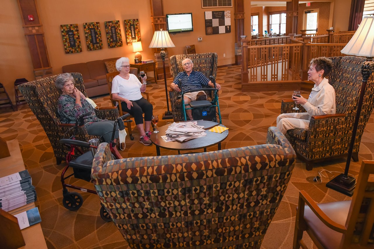 group of people chatting in lobby