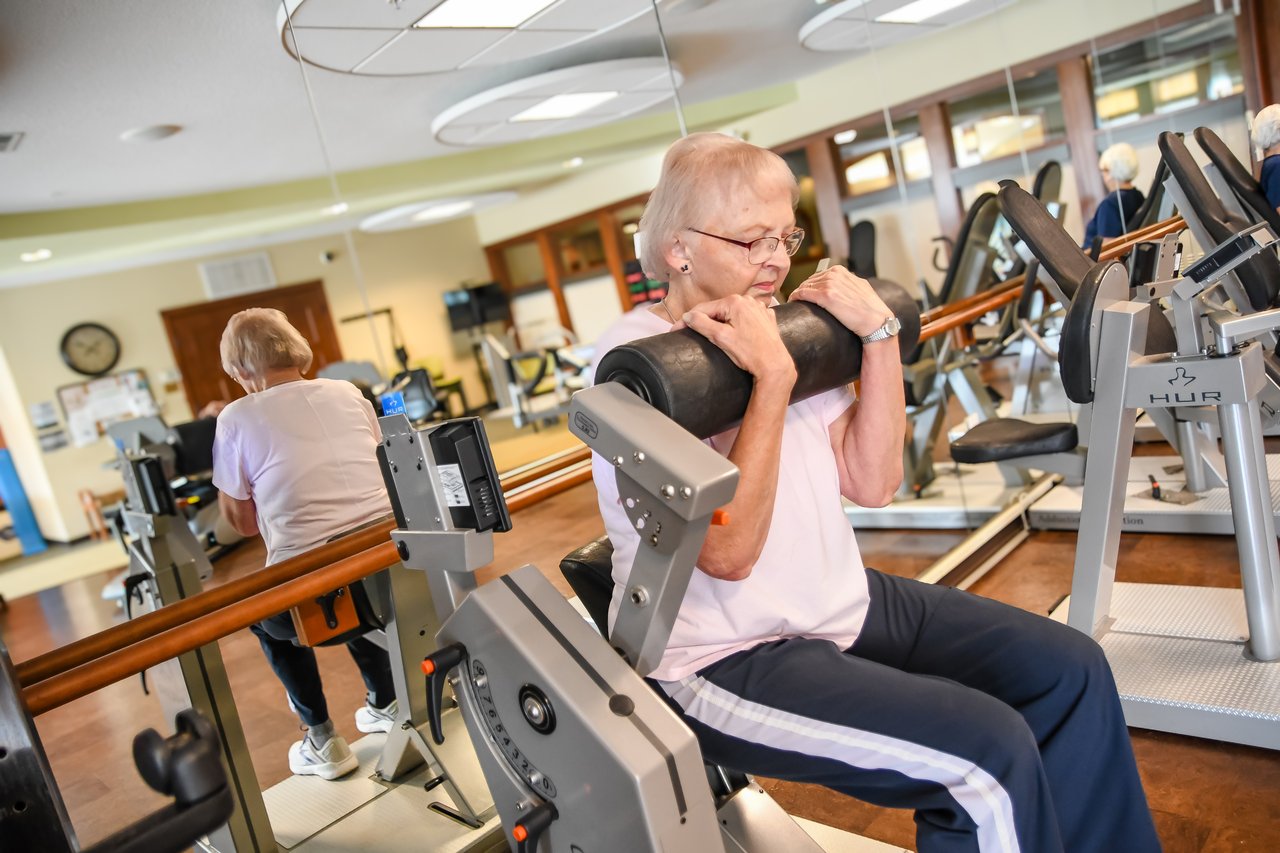 Photo of a woman exercising in senior fitness center