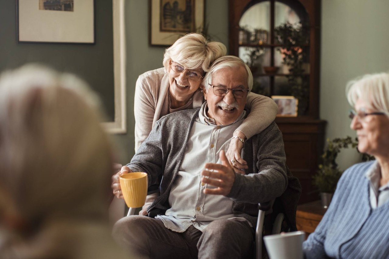 woman hugging happy man from behind